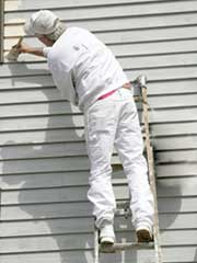 Man painting a home in Tampa